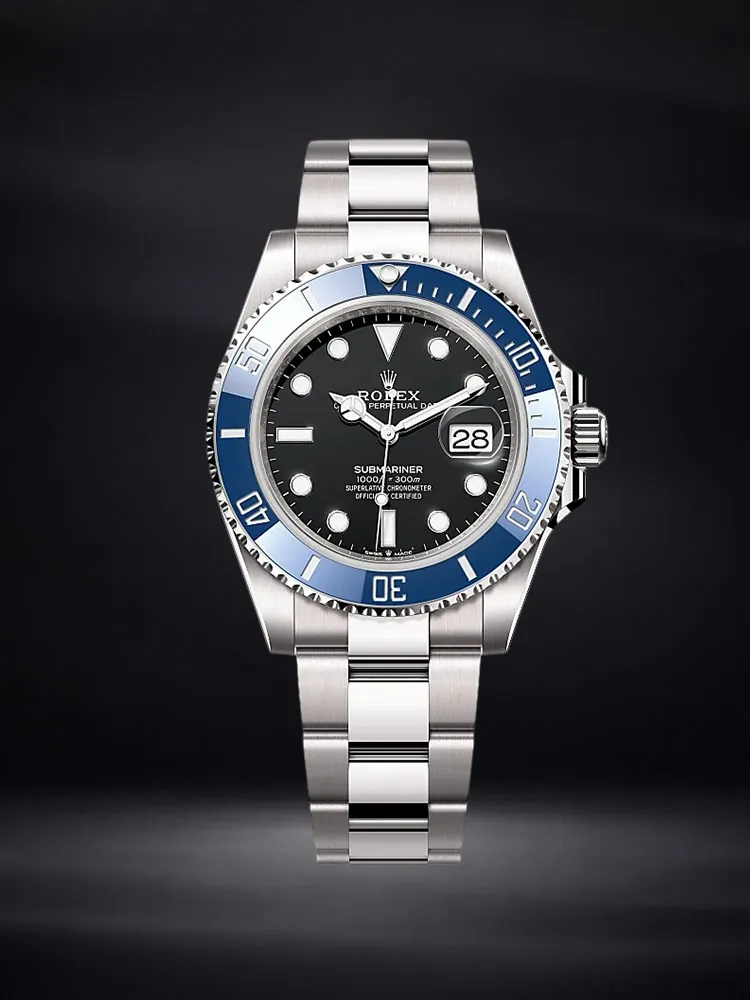 Rolex Submariner watch with a blue bezel on a deep navy background.