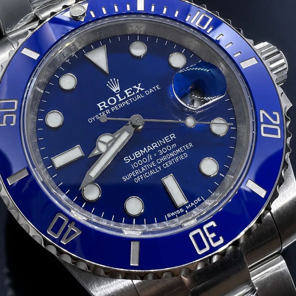 Rolex Submariner with blue dial and stainless steel bracelet.