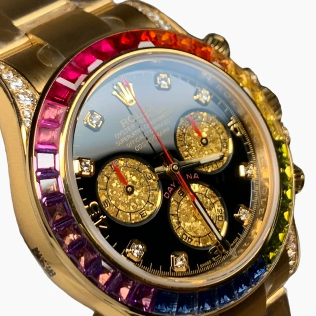 Men’s luxury rainbow bezel chronograph watch with black dial, sparkling gold subdials, diamond hour markers, and yellow gold design