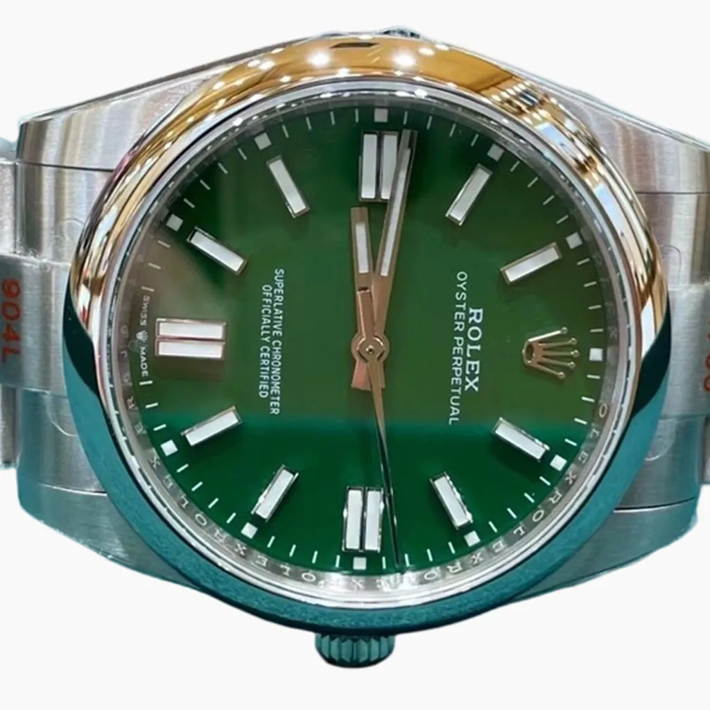 Rolex Oyster Perpetual green dial watch with stainless steel Oyster bracelet