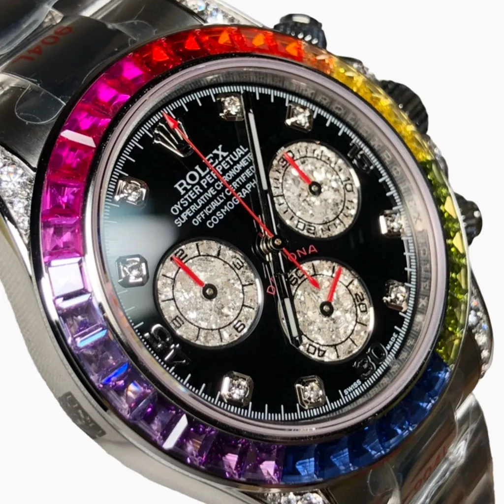 Rolex Daytona Rainbow-style watch with colorful gemstone bezel, black dial, diamond markers, and steel bracelet