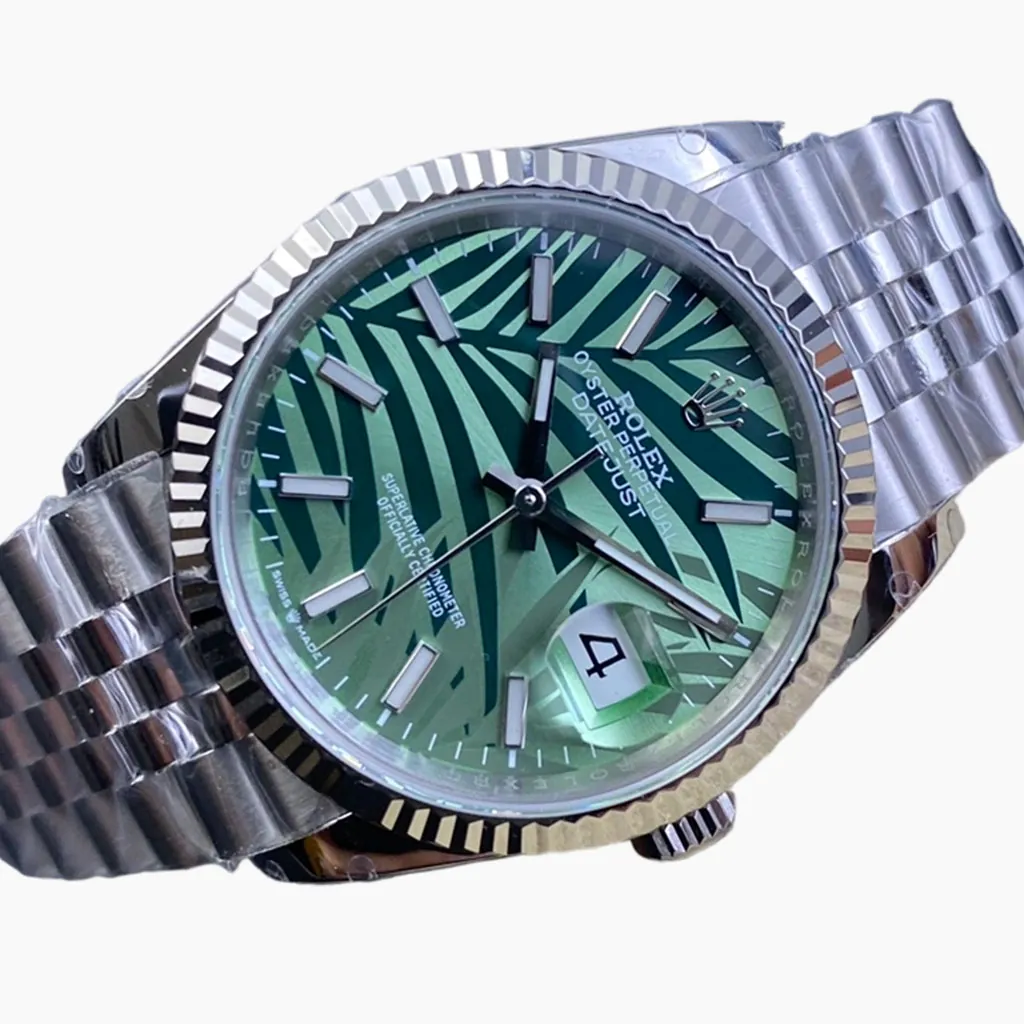 Rolex Datejust 36 126234 green palm dial watch with fluted bezel, date window, Cyclops lens, and stainless steel Jubilee bracelet.