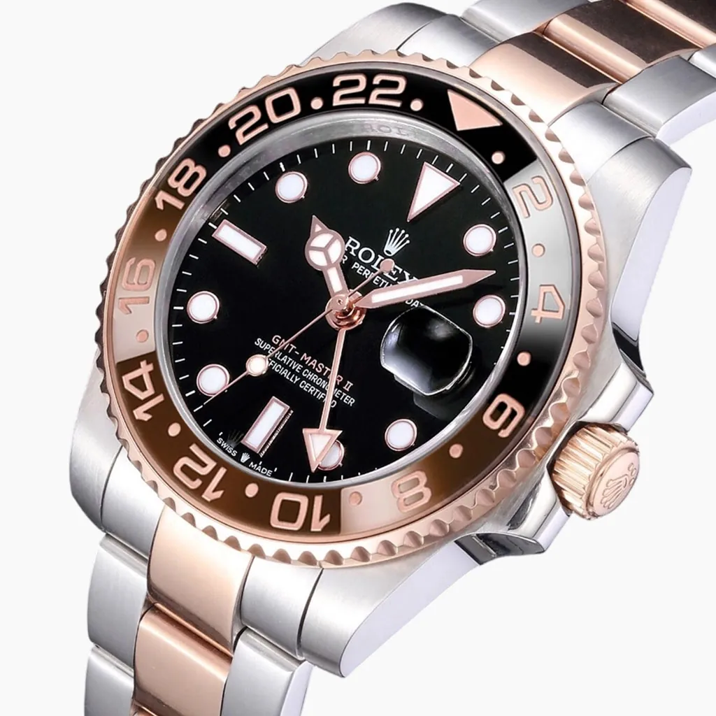 Rolex GMT-Master II Root Beer watch with black dial, brown and black bezel, two-tone rose gold Oyster bracelet and magnified date window