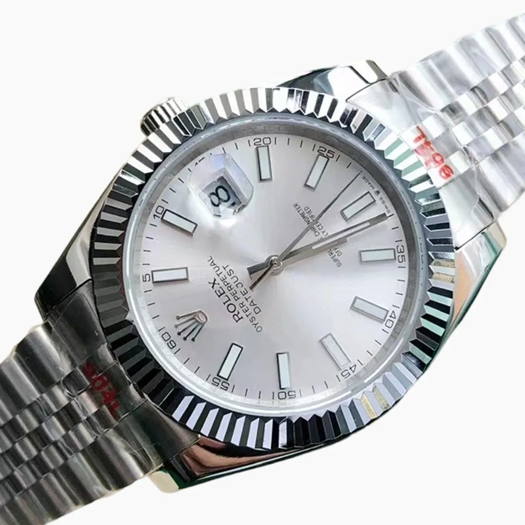 Rolex Oyster Perpetual Datejust silver dial watch with fluted bezel, date window, and Jubilee bracelet.