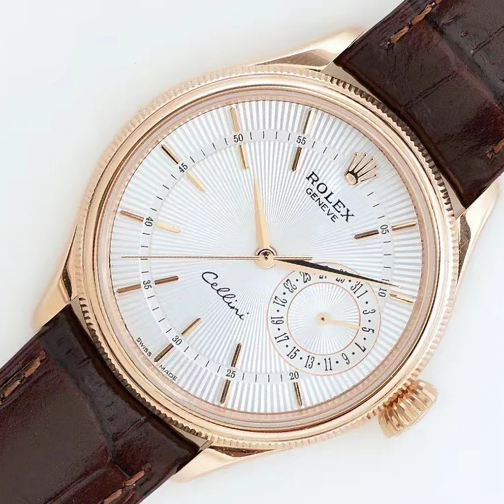 Rolex Cellini Date watch with white guilloch&eacute; dial, rose gold case, and brown leather strap.