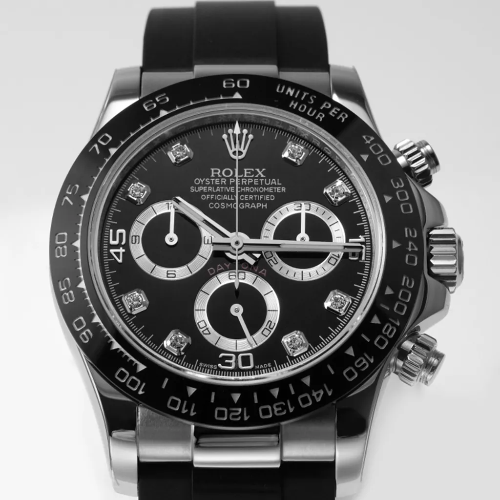 Rolex Cosmograph Daytona watch with black dial, diamond hour markers, ceramic bezel, and black Oysterflex strap.