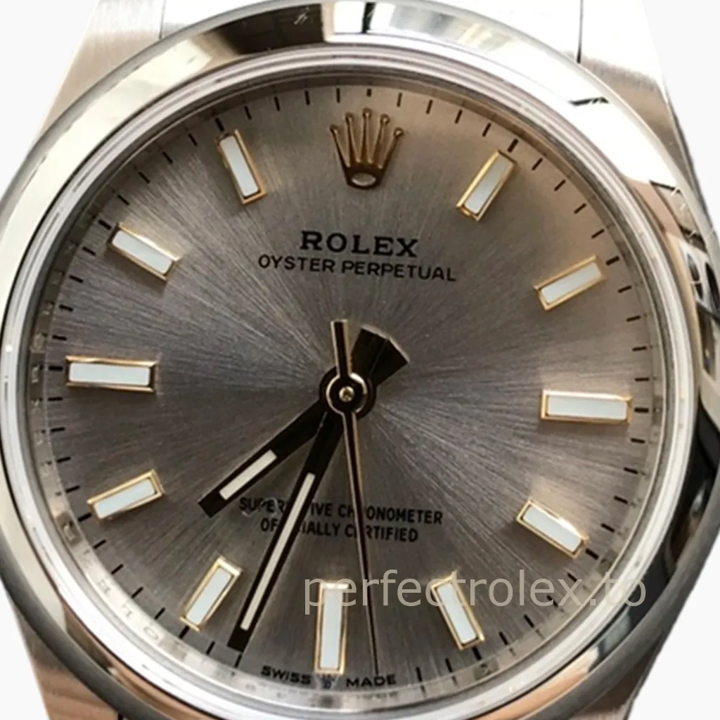 Rolex Oyster Perpetual watch with gray sunburst dial, stainless steel case, Oyster bracelet, and baton hour markers close-up