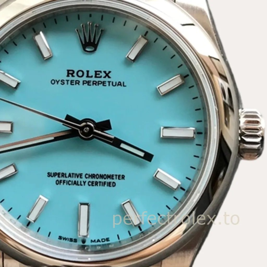 Rolex Oyster Perpetual watch with turquoise blue dial, stainless steel case, Oyster bracelet, and baton hour markers close-up