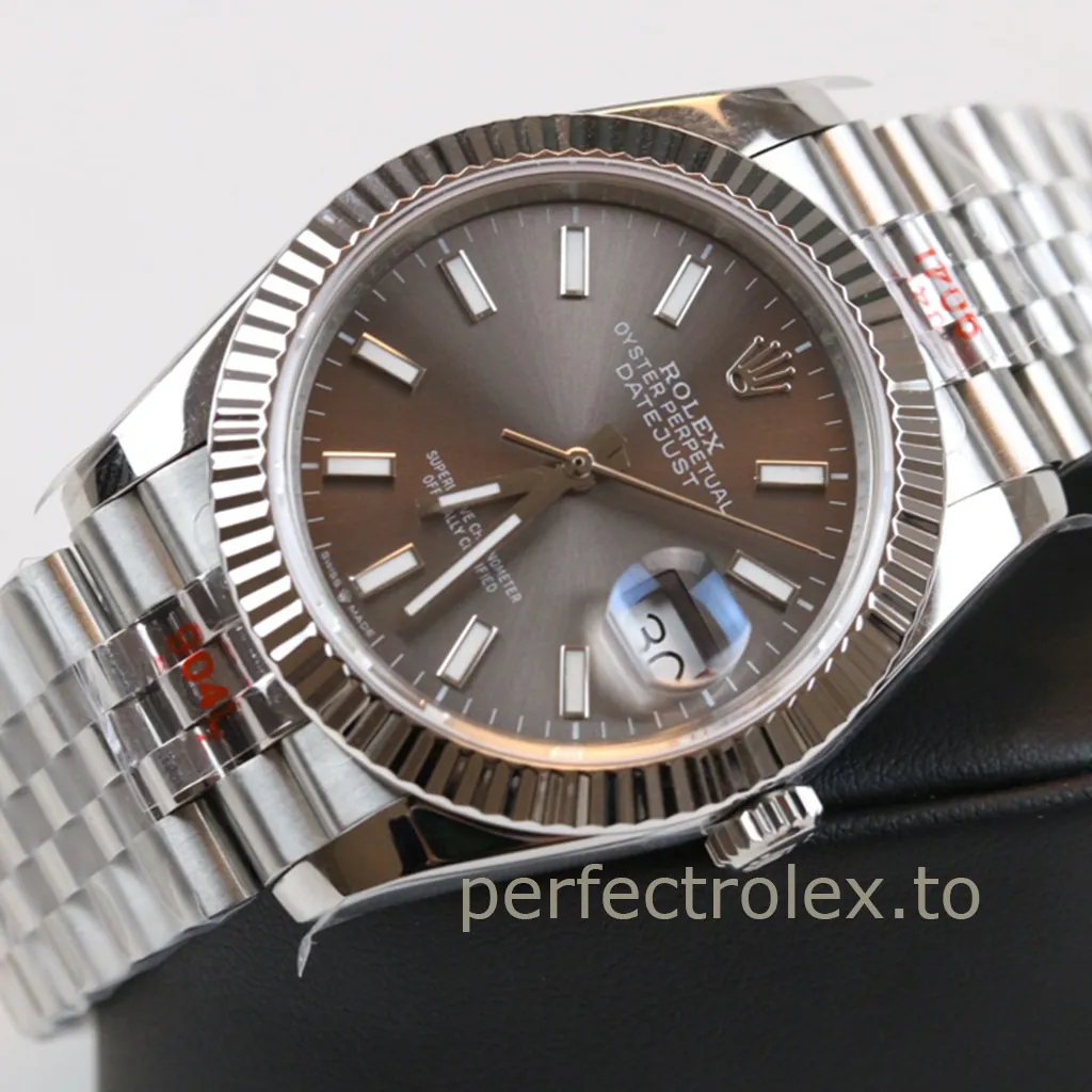 Rolex Datejust watch with gray dial, fluted bezel, Jubilee bracelet, date window, and baton hour markers close-up