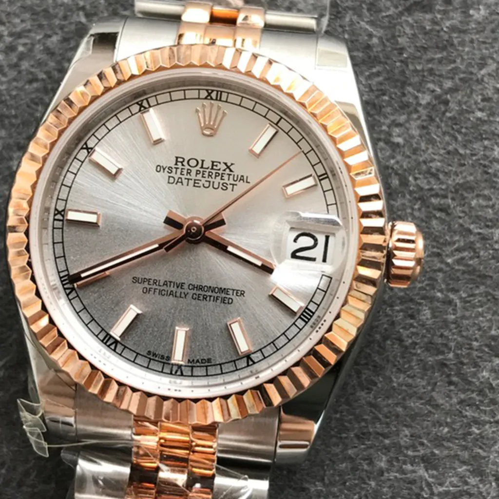 Rolex Oyster Perpetual Datejust silver dial watch with rose gold fluted bezel, Cyclops date window and two-tone Jubilee bracelet