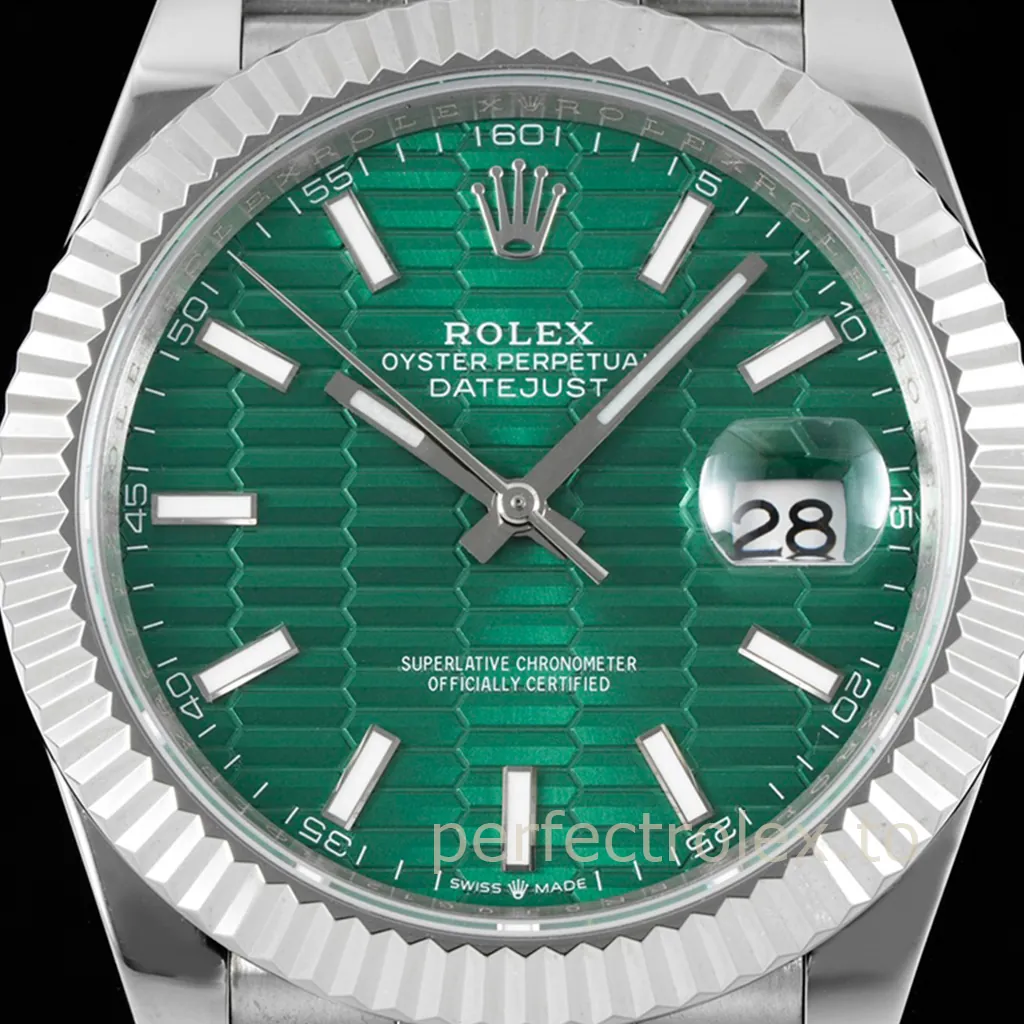 Rolex Oyster Perpetual Datejust watch with green patterned dial, fluted bezel, date window, and stainless steel bracelet.