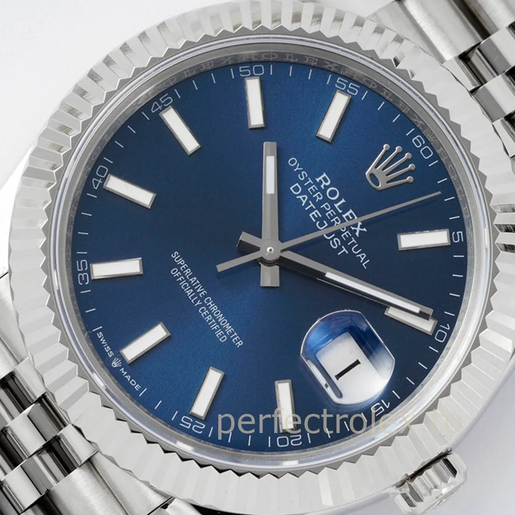 Rolex Oyster Perpetual Datejust blue dial watch with fluted bezel, Jubilee bracelet, and date magnifier.