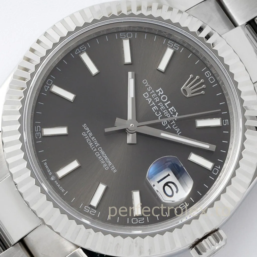 Rolex Oyster Perpetual Datejust grey dial watch with fluted bezel, Oyster bracelet, and Cyclops date window.