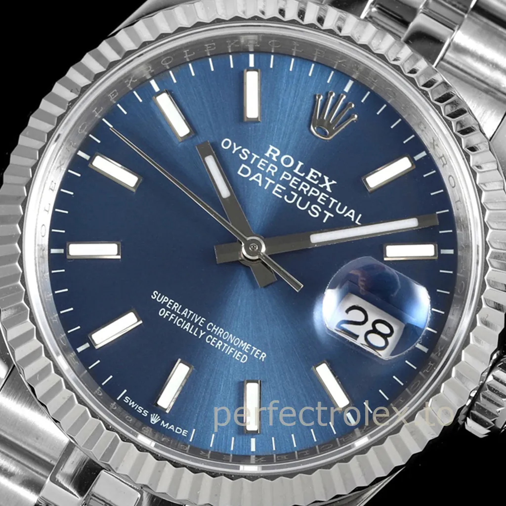 Rolex Datejust 36 blue dial watch with baton hour markers, white gold fluted bezel, Oyster bracelet and Cyclops date window.