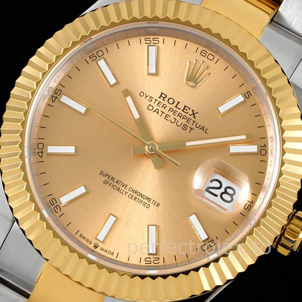 Rolex Oyster Perpetual Datejust two-tone watch with champagne dial, gold fluted bezel, baton hour markers, and magnified date window.