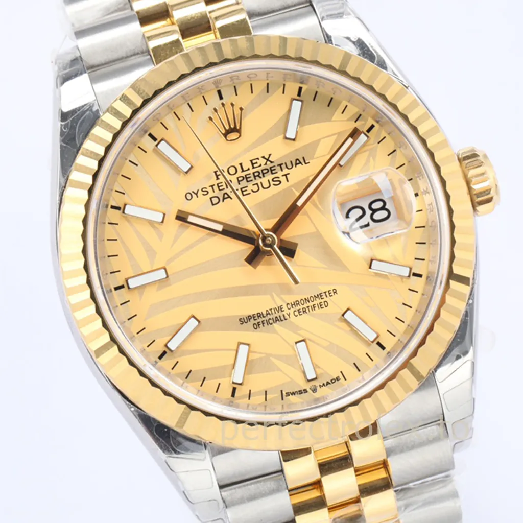 Rolex Datejust 36 Yellow Rolesor watch with champagne palm motif dial, fluted bezel, Jubilee bracelet, and Cyclops date display.