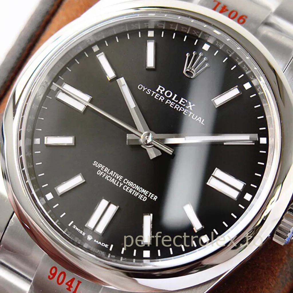 Rolex Oyster Perpetual watch with a black dial, luminous baton hour markers, polished steel bezel, and stainless steel Oyster bracelet.