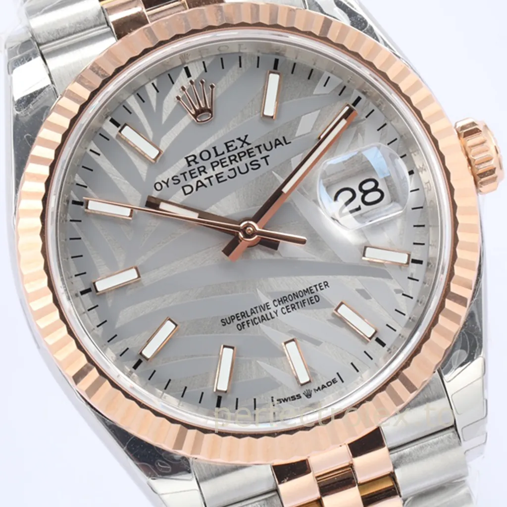 Rolex Datejust 36 Everose Rolesor watch with silver palm motif dial, fluted bezel, Jubilee bracelet, and Cyclops date display.
