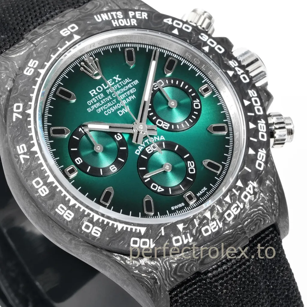 Rolex Cosmograph Daytona DIW carbon watch with emerald green dial, matching chronograph subdials, carbon tachymeter bezel, and black fabric strap.