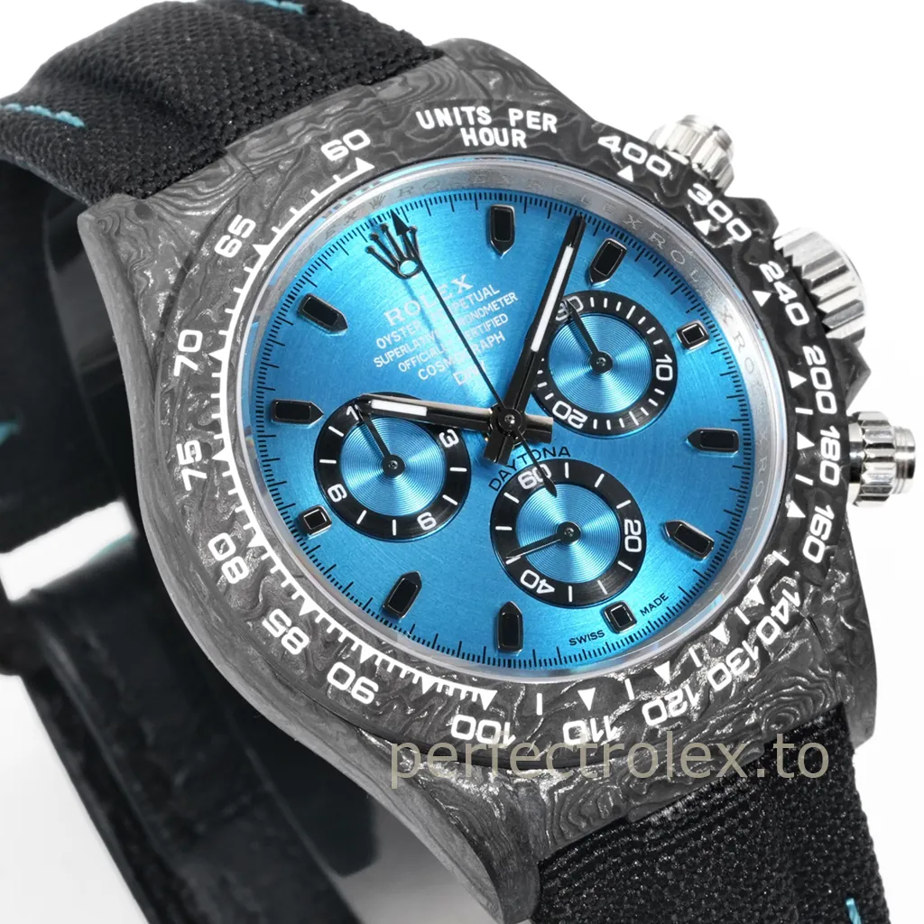 Rolex Cosmograph Daytona chronograph with a blue dial, black subdials, forged carbon case, tachymeter bezel, and black fabric strap.