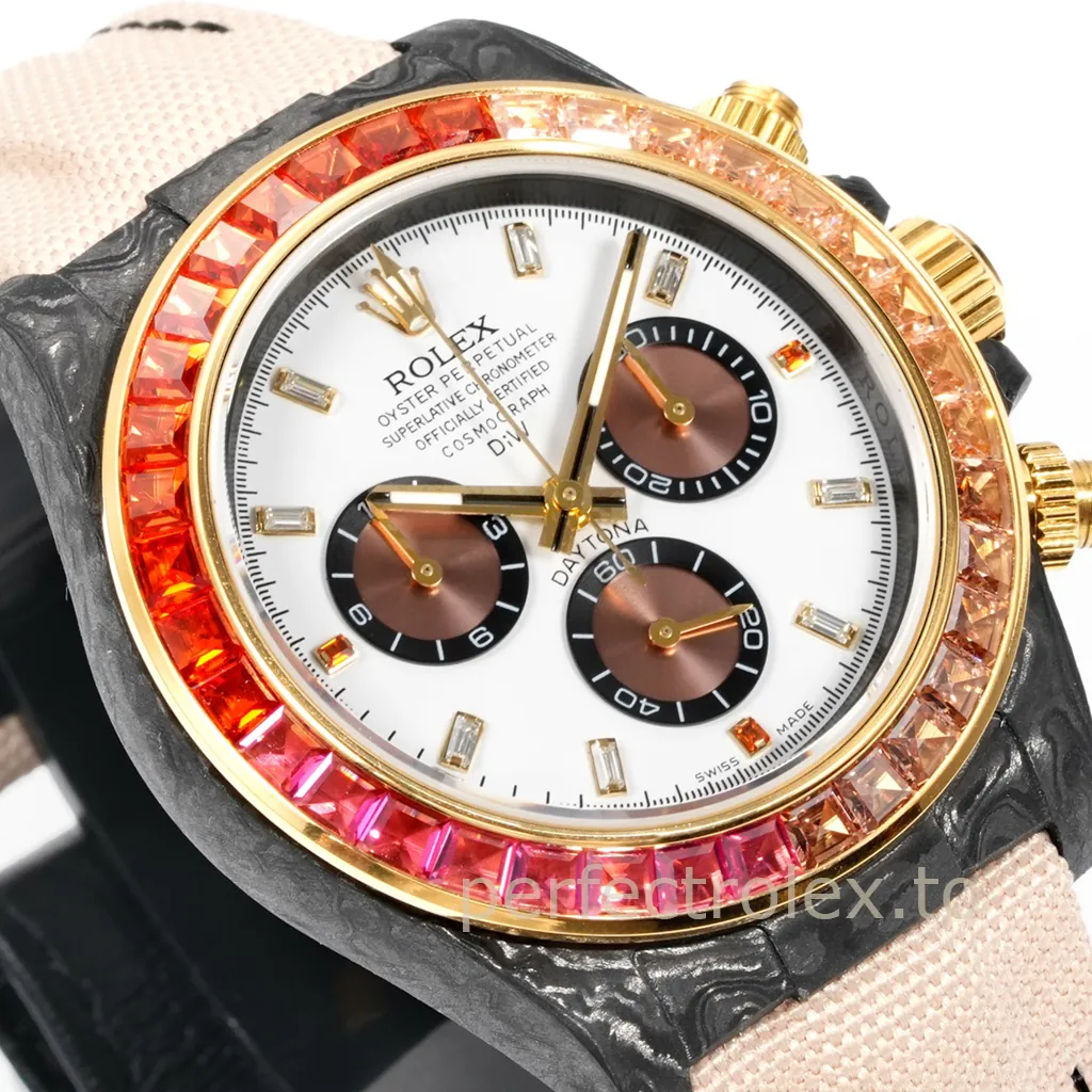 Rolex Cosmograph Daytona DIW carbon watch with white dial, brown chronograph subdials, gold accents, multicolor gemstone bezel, and pink fabric strap.