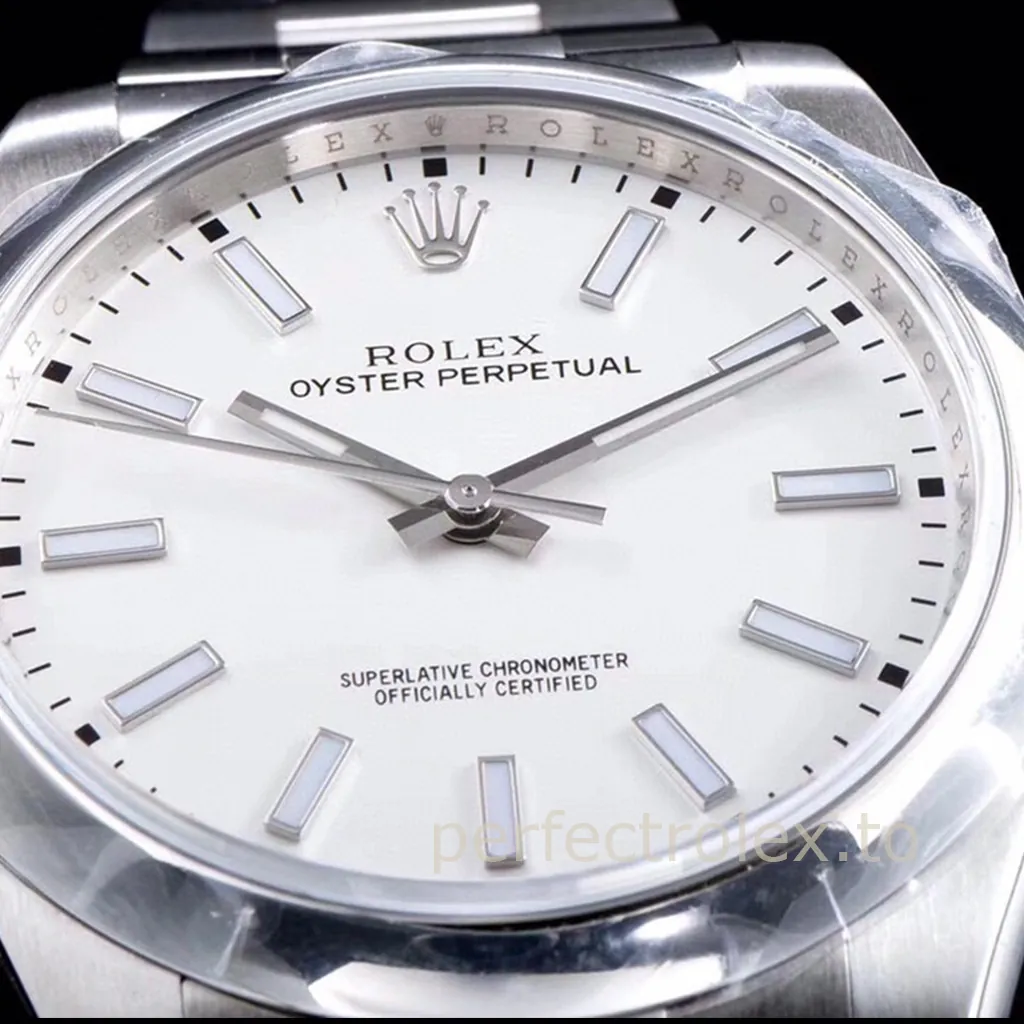Rolex Oyster Perpetual watch with a white dial, luminous baton hour markers, silver hands, and stainless steel case.