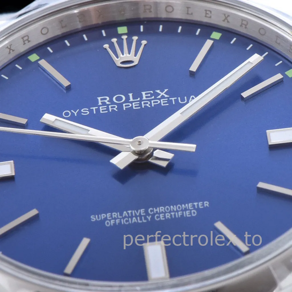 Rolex Oyster Perpetual watch with a blue dial, silver baton hour markers, luminous hands, and green minute accents.