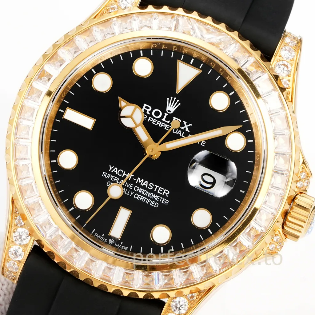 Rolex Oyster Perpetual Yacht-Master gold watch with black dial, diamond-set bezel and lugs, luminous markers, date window, and black rubber strap.
