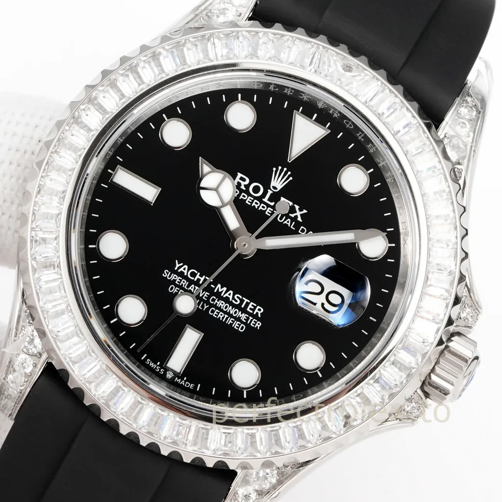Rolex Yacht-Master watch with a black dial, diamond-set bezel and lugs, date window, silver-tone case, and black rubber strap.