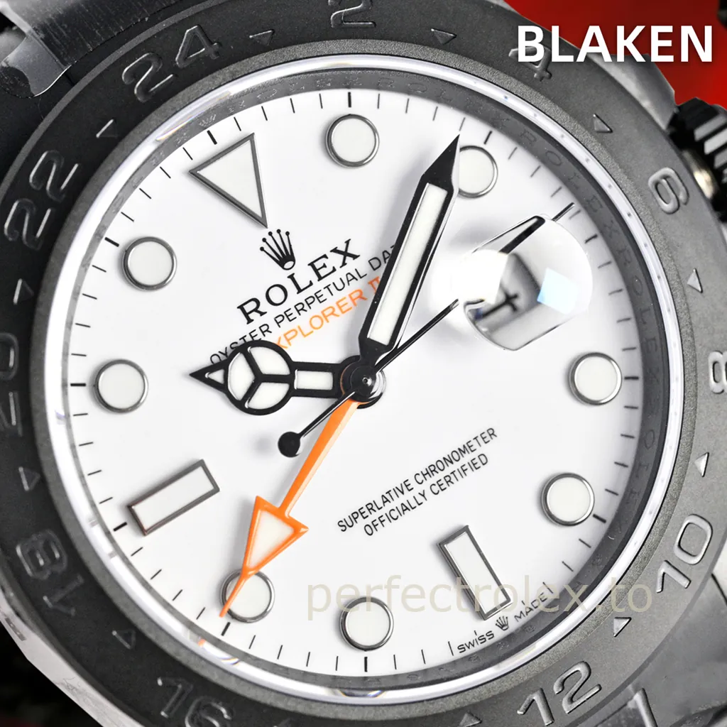 Blaken Rolex Oyster Perpetual Explorer II Date with white dial, black DLC bezel, luminous markers, orange GMT hand, and Cyclops date window.