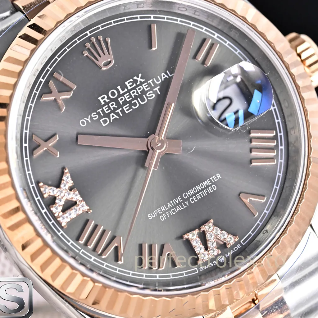 Rolex Oyster Perpetual Datejust with slate dial, diamond Roman numerals, rose gold fluted bezel, and Cyclops date window.