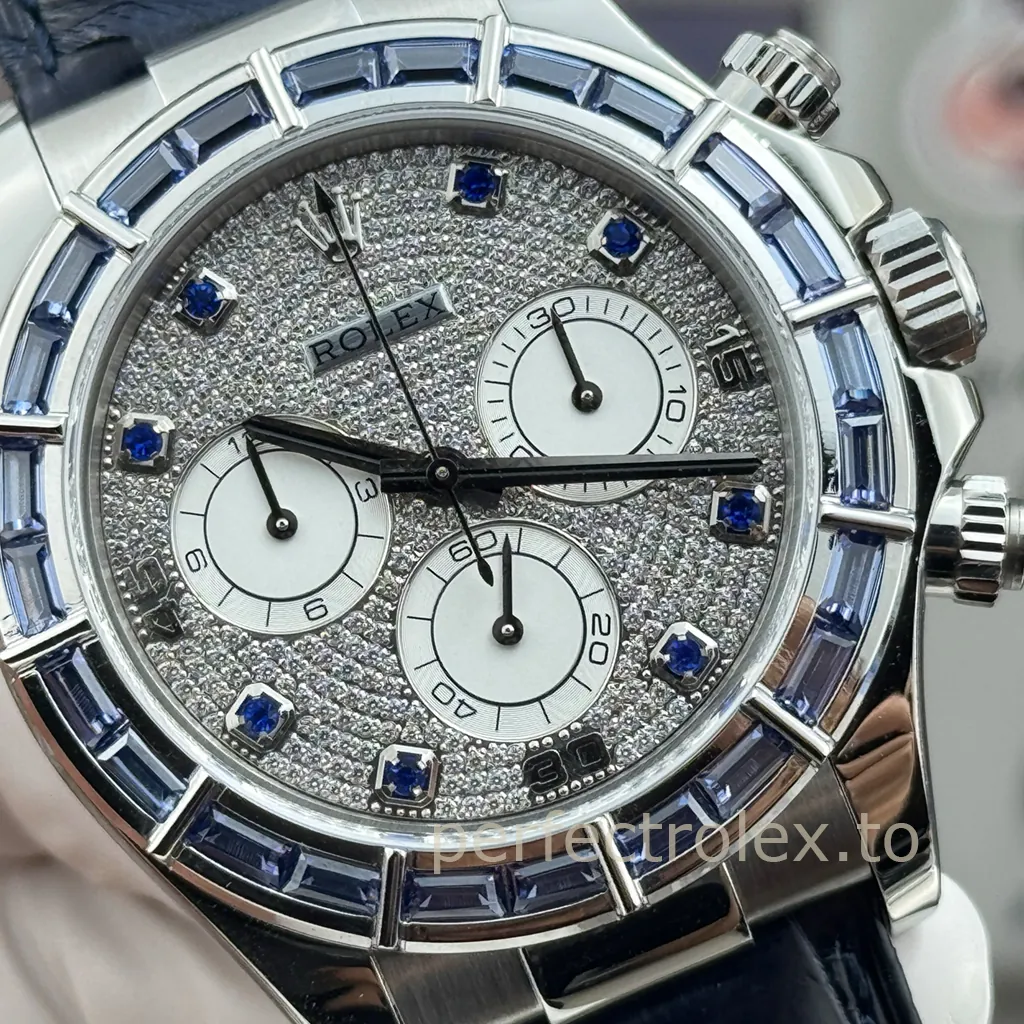 Rolex Cosmograph Daytona with a diamond-pavé dial, blue sapphire hour markers, baguette sapphire bezel, chronograph subdials and black leather strap.