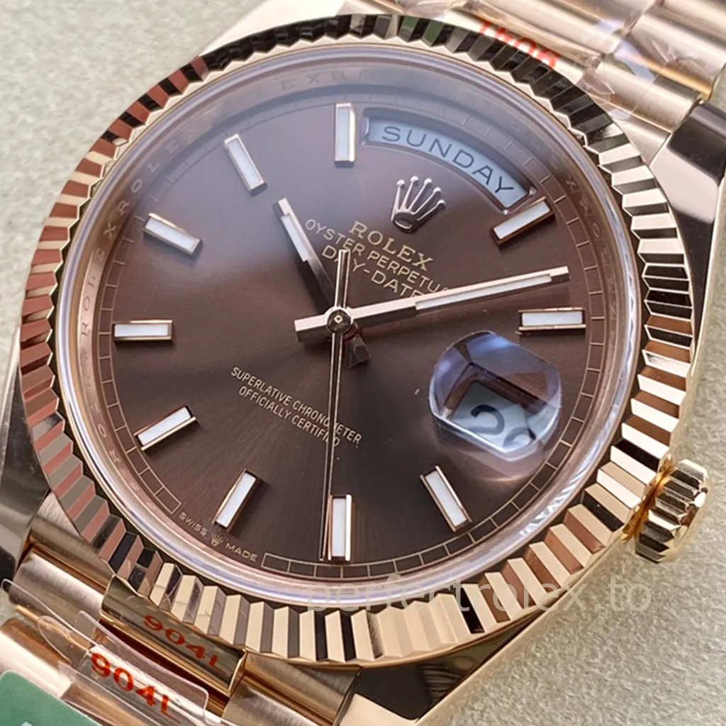 Rolex Day-Date Everose gold watch with a chocolate sunburst dial, luminous baton markers, fluted bezel, President bracelet, full-day display, and Cyclops date window.